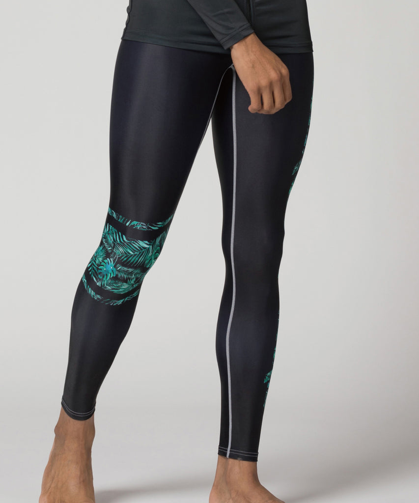 leaf pattern and lettering with black background compression pants for weightlifting or summer leggings